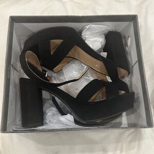 Sun + Stone black Lilla heels. Size 10.